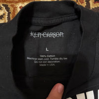 (L) Ken Carson a great chaos Tour merch tee